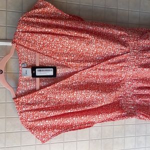 Ichi Orange sundress with white floral pattern and pockets!